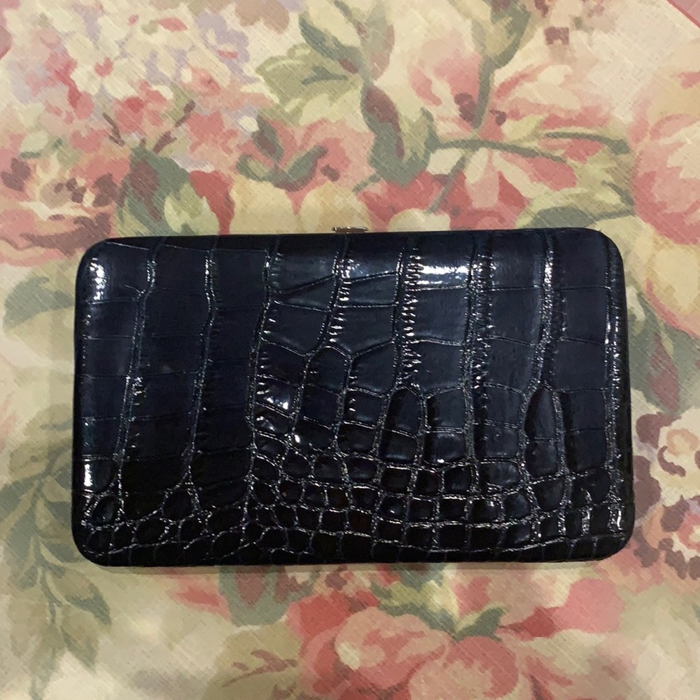 Faux leather flat wallet, 4 credit card slots, ID pocket, zipper for coins.